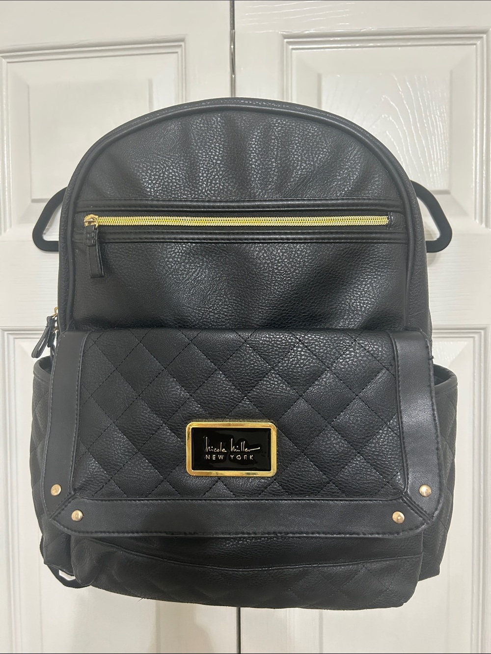 Nicole Miller Black Quilted Backpack with Gold Accents